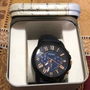 Fossil rose gold leather watch